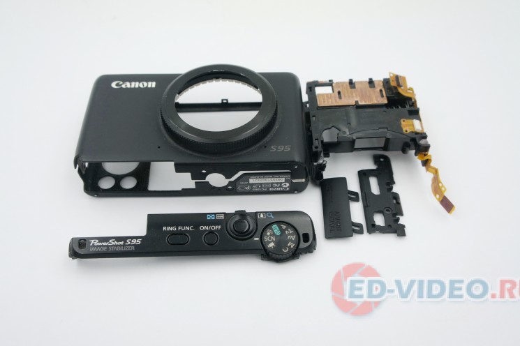 Корпус в сборе с кнопкой спуска и колесом переключения режимов на Canon PowerShot S95 (разборка)